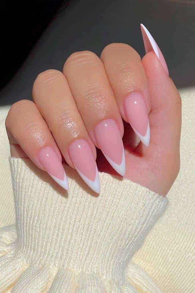 Sheer nude stiletto nails with micro French tips
