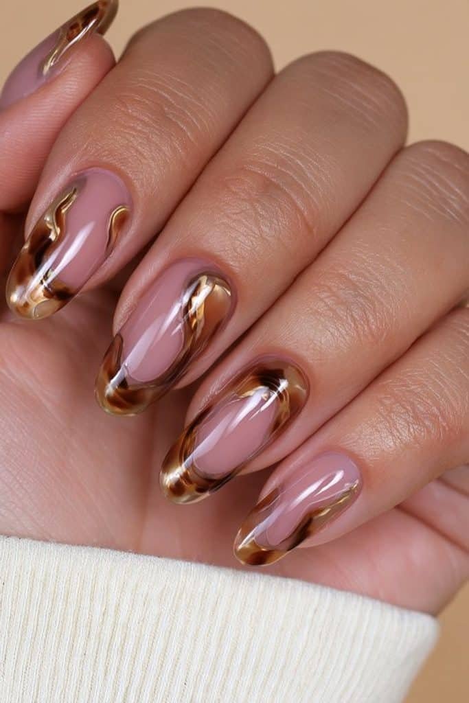 Tortoiseshell nails with clean sheer negative-space sections