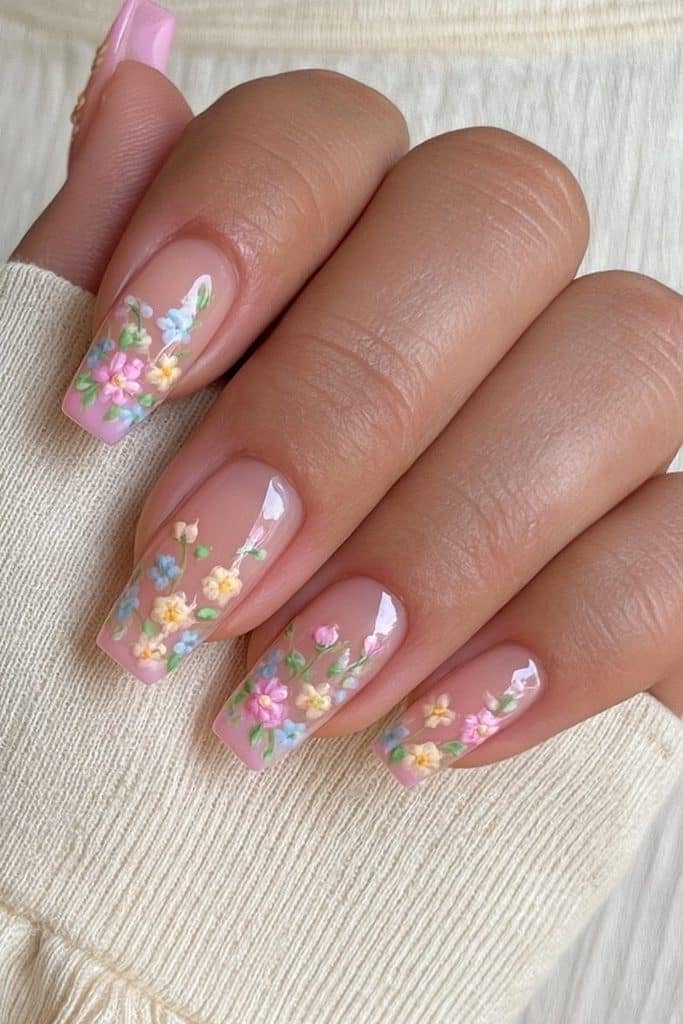 Sheer nude coffin nails with delicate floral accents