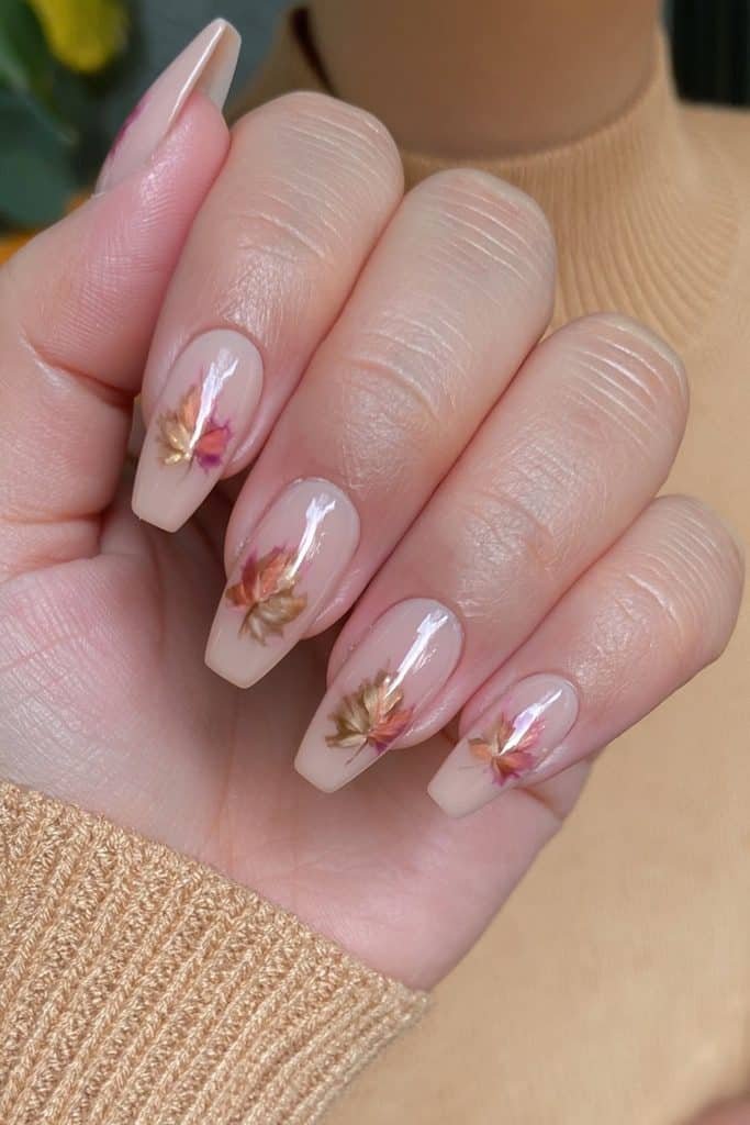 Nude coffin nails with warm autumn maple leaf art