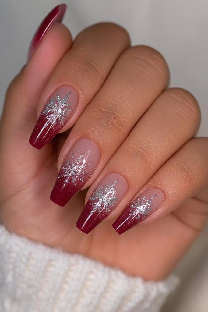 Red and silver nails with festive snowflakes