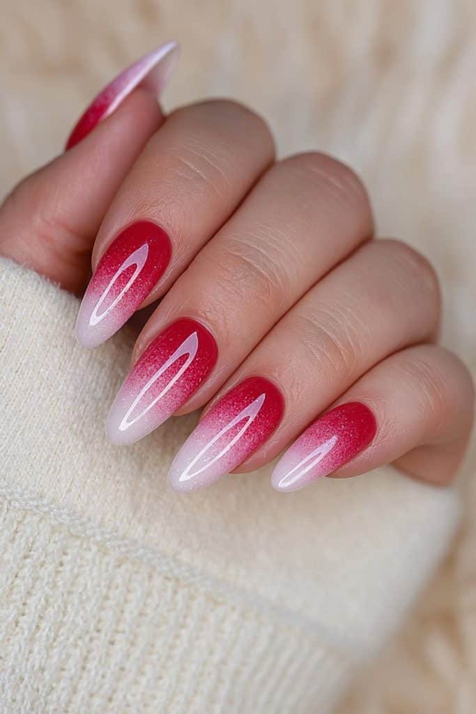 Red and white gradient candy cane almond nails