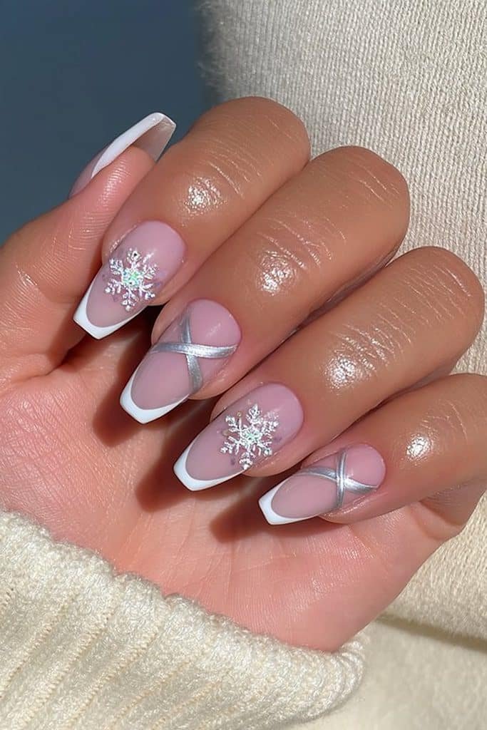 French tip nails with snowflakes and silver ribbons