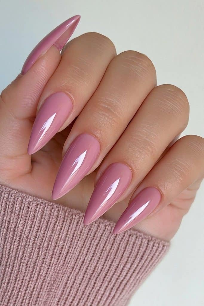 Soft mauve stiletto nails with creamy glossy finish