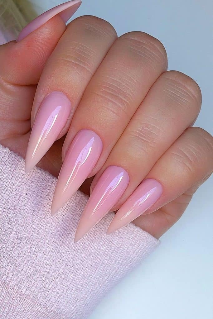 Soft rose pink stiletto nails with glossy finish