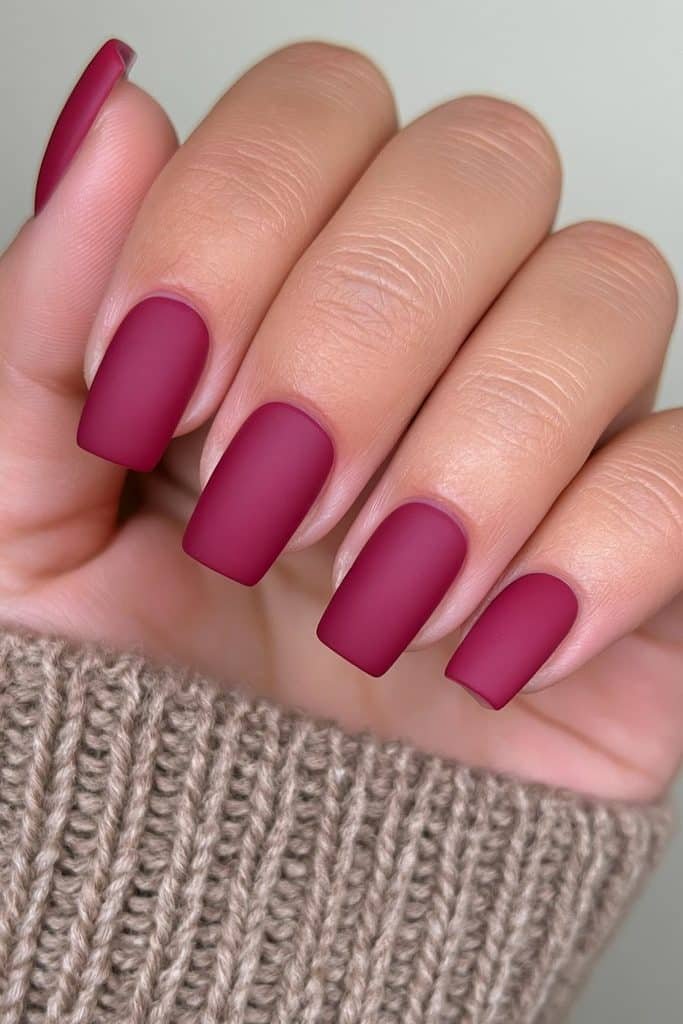 Deep cranberry square nails with velvety matte finish