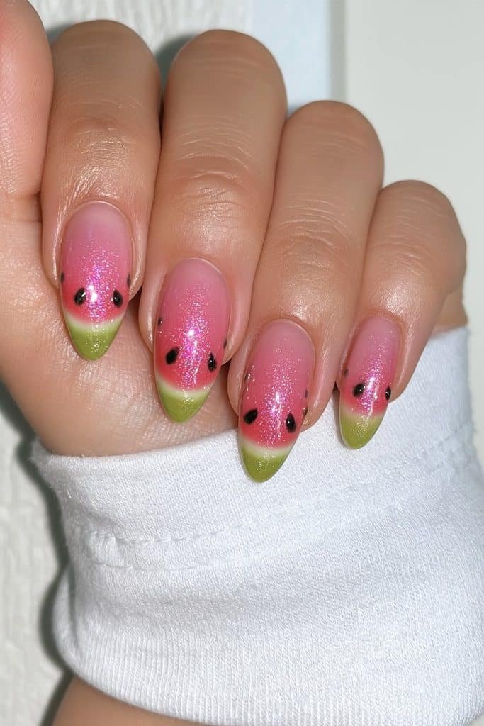 Watermelon-inspired red and green almond nails