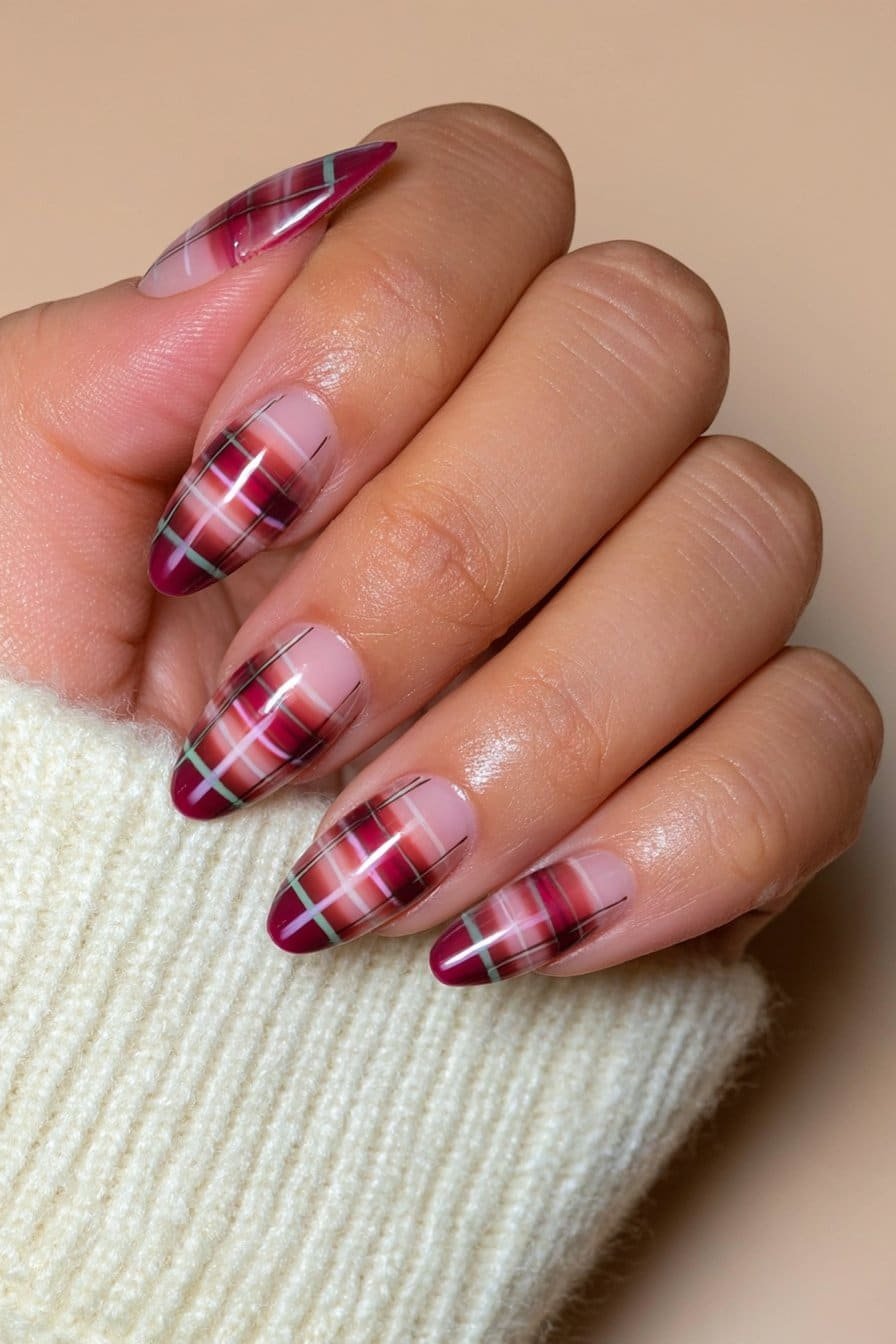 Burgundy plaid nails with fine wine-red lines over a warm nude and cream base