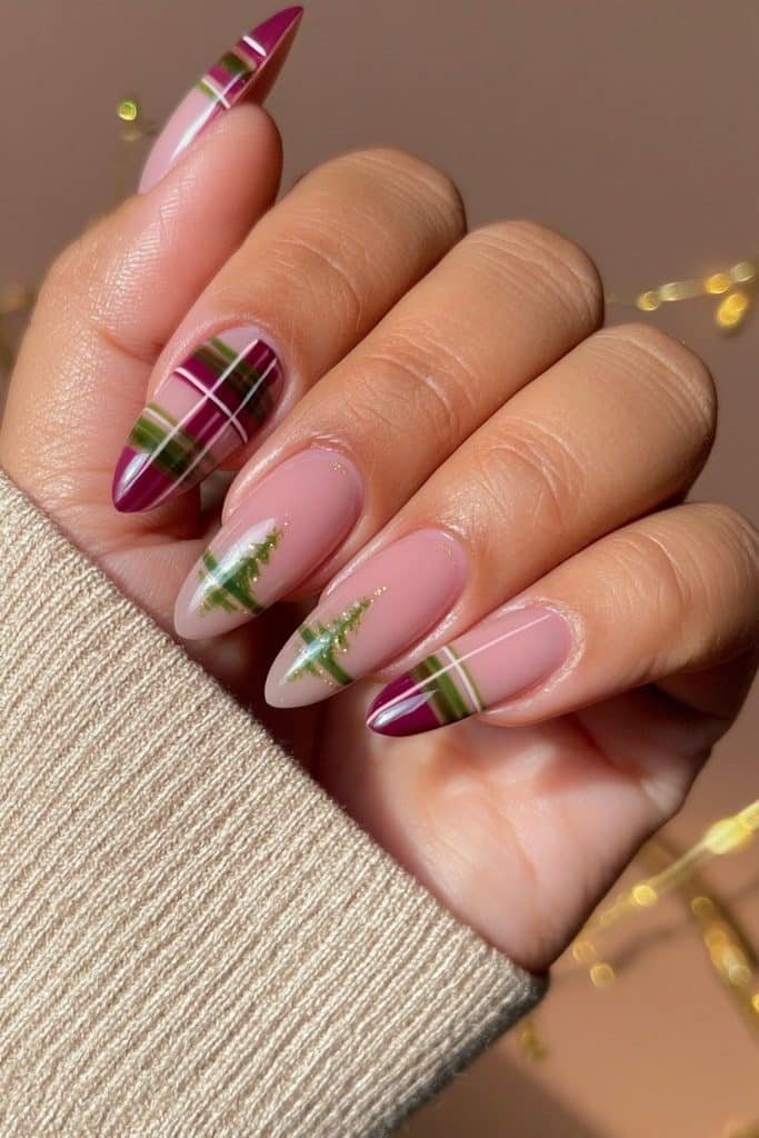 Burgundy and forest-green plaid nails with delicate Christmas tree accents
