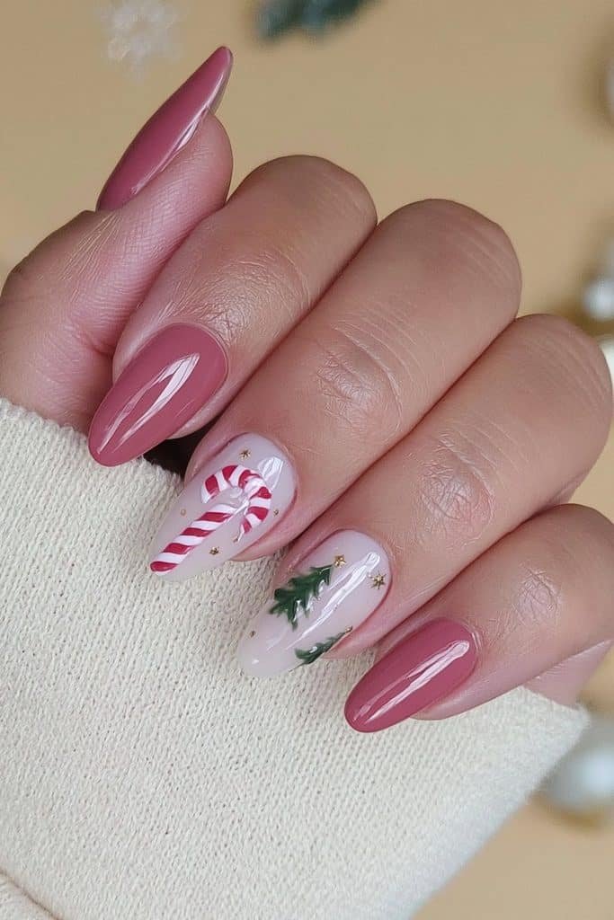 Green Christmas tree nail art with red-and-white candy cane stripes