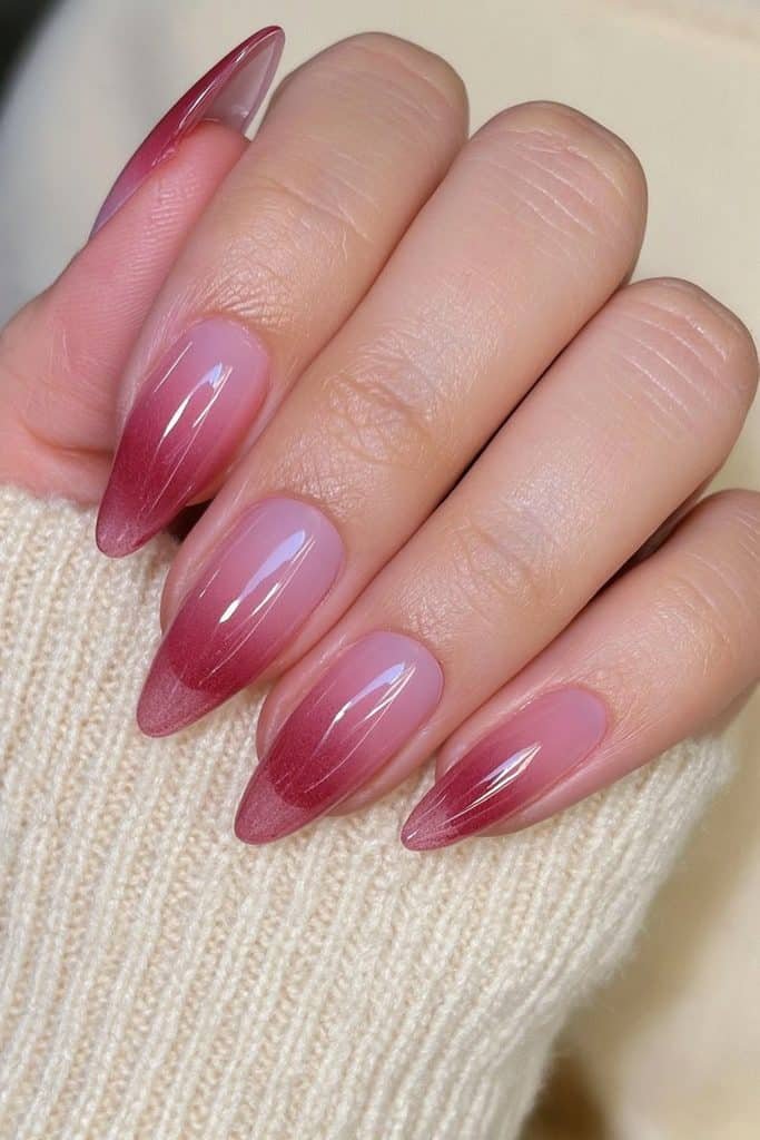 Cherry red jelly nails with translucent ruby-red color and glossy glass-like shine