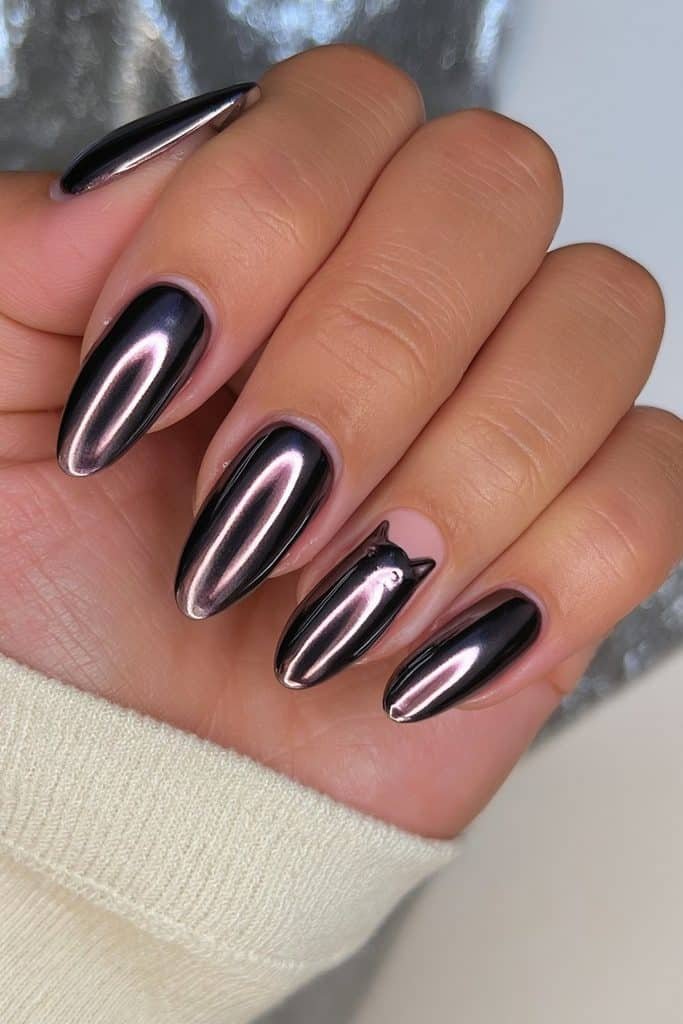 Reflective black chrome nails with gunmetal highlights and raised cat silhouettes