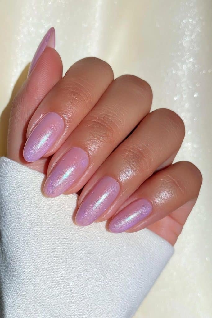 Classic creamy sugar plum nails in muted berry-purple with soft mauve undertones