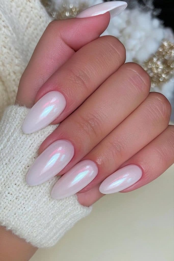 Classic white ski nails with a snowy milky finish and subtle icy shimmer