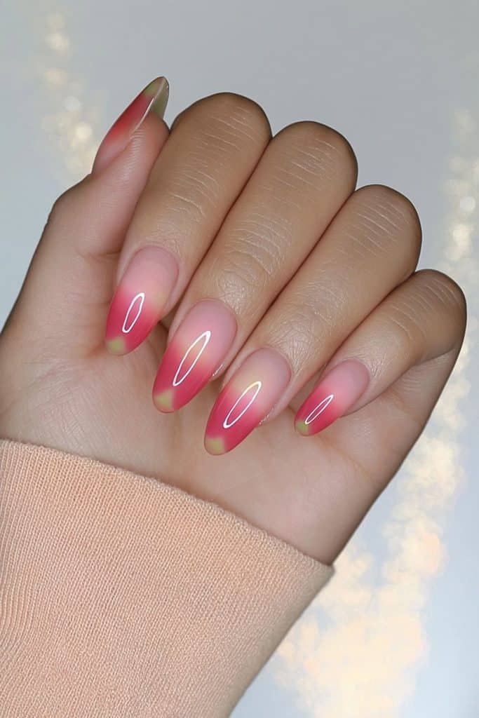 Coral and peach jelly nails with translucent warm tones and luminous glossy depth