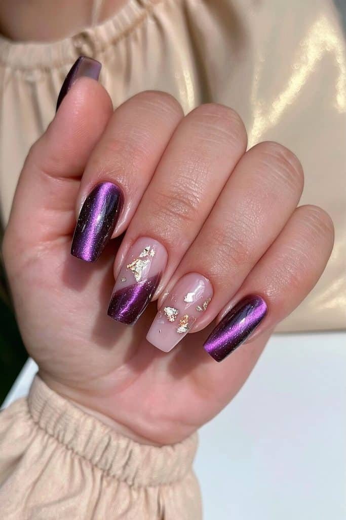 Dark purple square cat-eye nails with luminous violet bands and delicate gold foil accents
