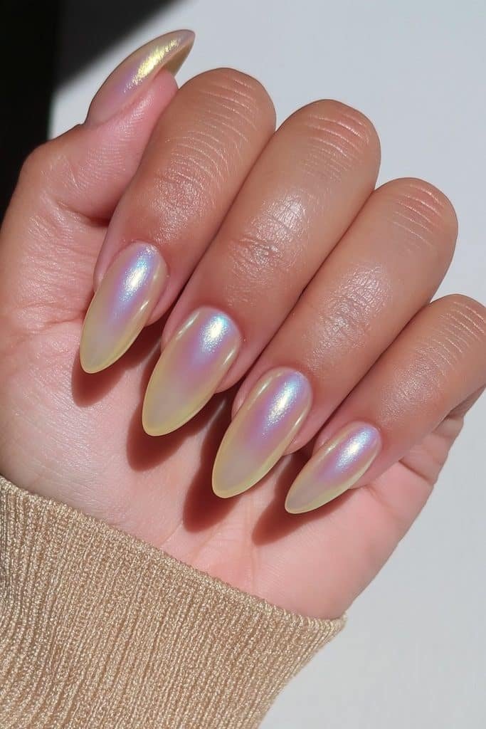 Milky jelly nails with pearl chrome glaze and luminous iridescent reflections