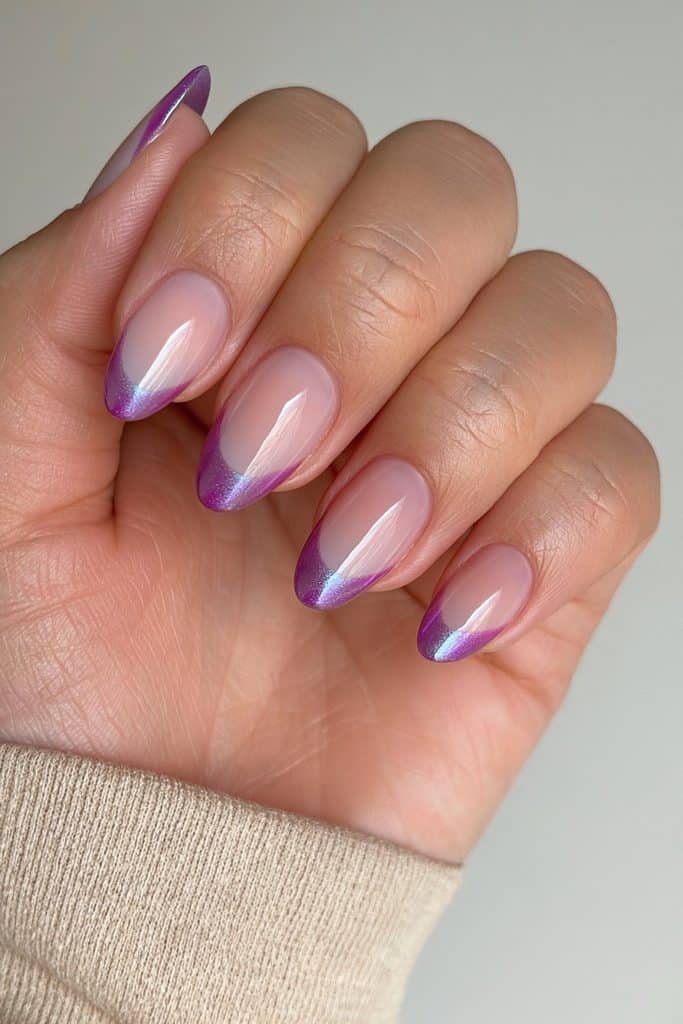 Sheer pink nails with sugar plum French tips and a delicate pearlescent glaze