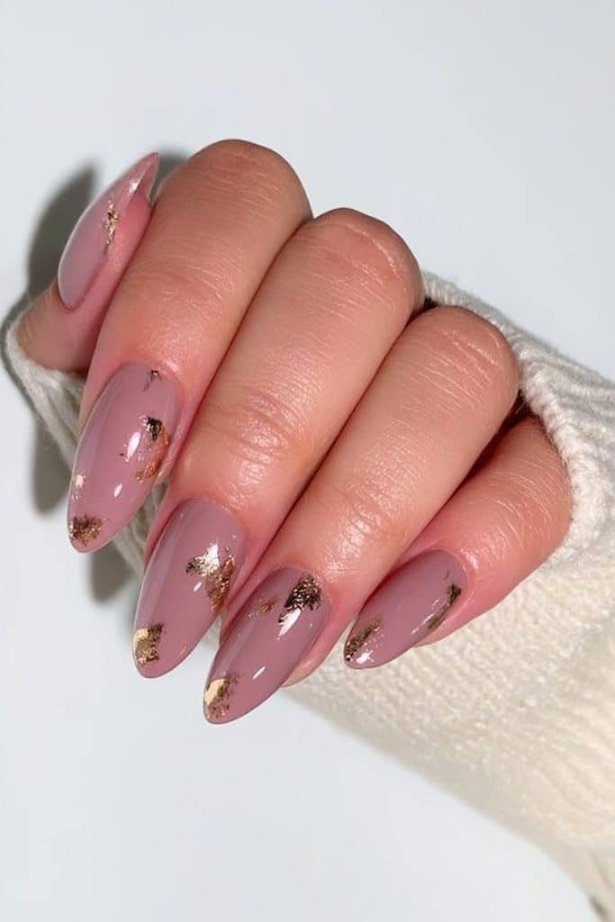 Mocha mousse nails with delicate gold foil accents and glossy coffee-brown polish