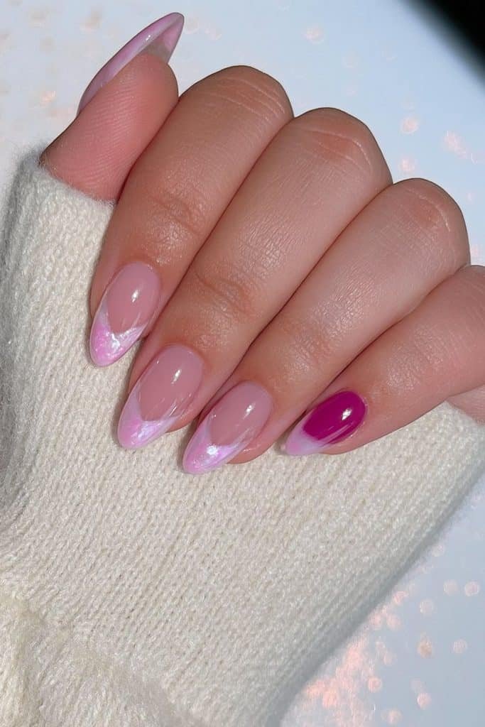 Sheer nude and blush jelly nails with one glossy cherry-red accent nail