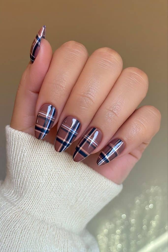 Ski lodge plaid nails with cranberry red, forest green, ivory, and fine charcoal stripes