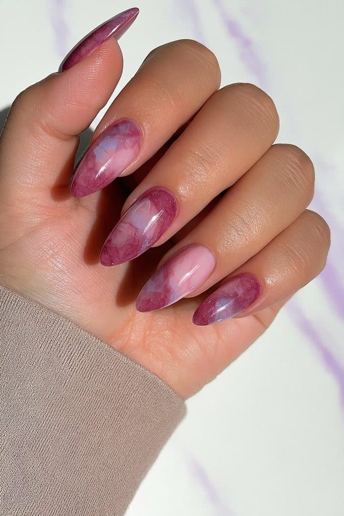 Sugar plum marble nails with swirling berry purple, dusty mauve, milky pink, and lavender