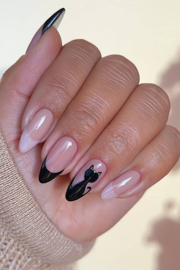 Minimalist black cat accent nail on a glossy milky nude manicure