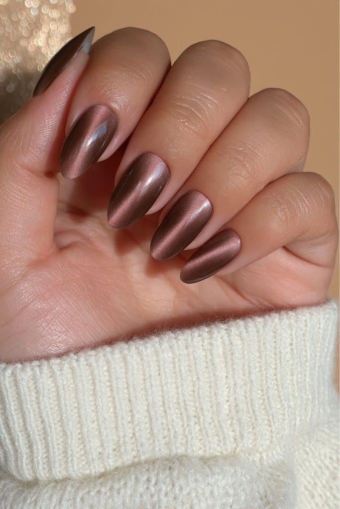 Mocha cat-eye nails with magnetic caramel-coffee glow and deep brown edges