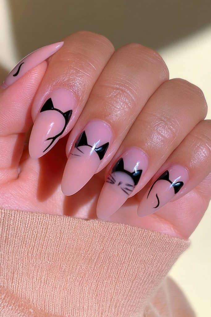 Minimalist black cat nails with fine curved silhouettes and sheer nude negative space