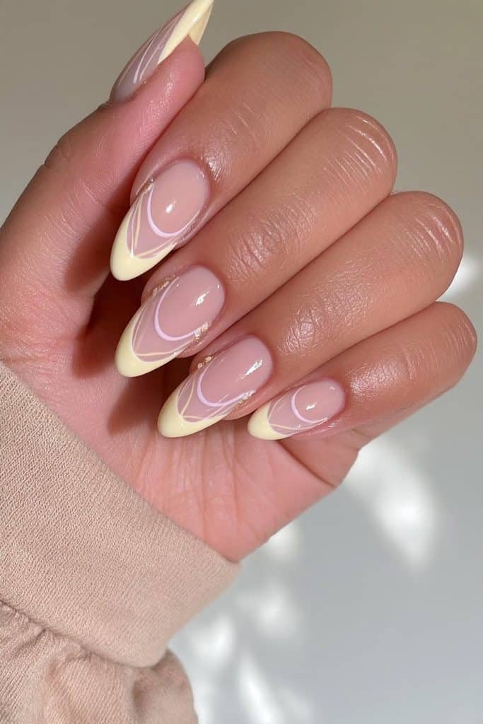 Minimalist butter yellow nails with geometric curves and clean negative-space details