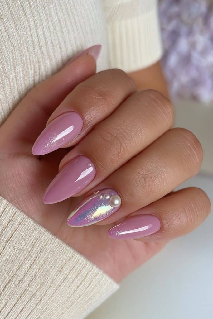Creamy sugar plum mauve nails with pearl-chrome reflections and tiny ivory pearls