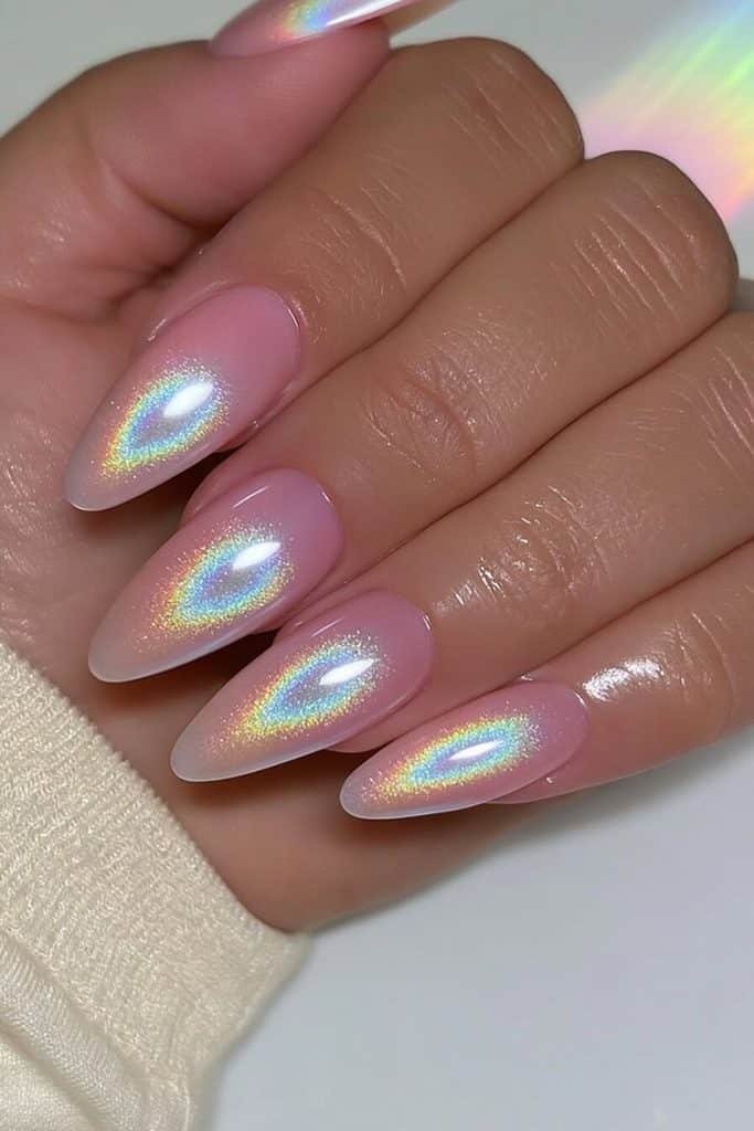 Pink rainbow cat-eye nails with iridescent baby pink, rose, lilac, peach, and champagne reflections