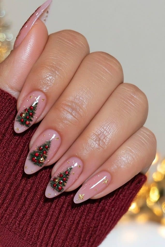 Forest-green Christmas tree nails with miniature red and gold ornaments