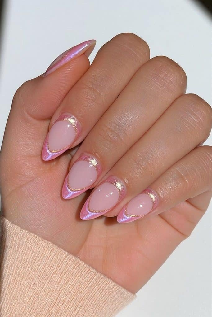Reverse pink cat-eye nails with delicate rosy magnetic arcs around the cuticles and a sheer blush base