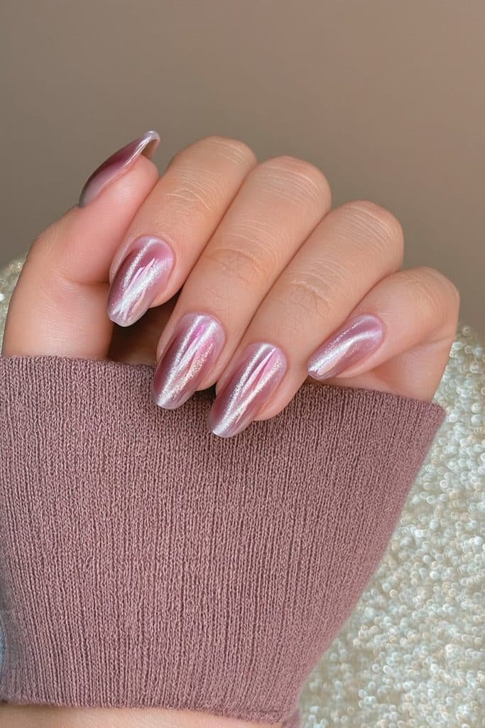 Berry plum jelly cat-eye nails with luminous velvet wine, mauve, and lavender reflections